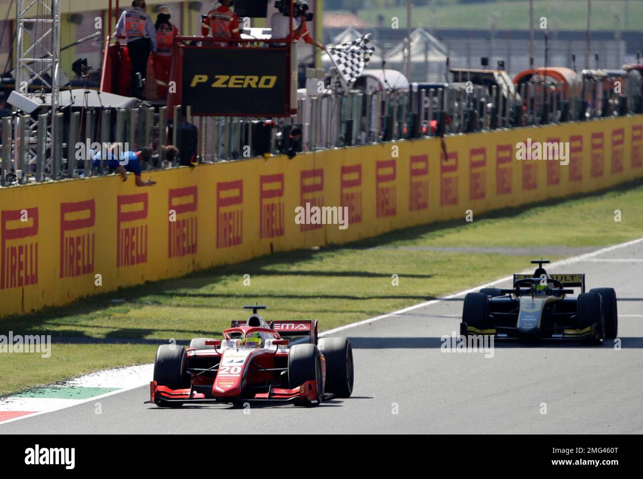 Prema driver Mick Schumacher of Germany, left, crosses the finish line to take fourth place during the F2 Sprint Race ahead of the Grand Prix of Tuscany, at the Mugello circuit in Scarperia, Italy, Sunday, Sept. 13, 2020. (AP Photo/Luca Bruno) Banque D'Images