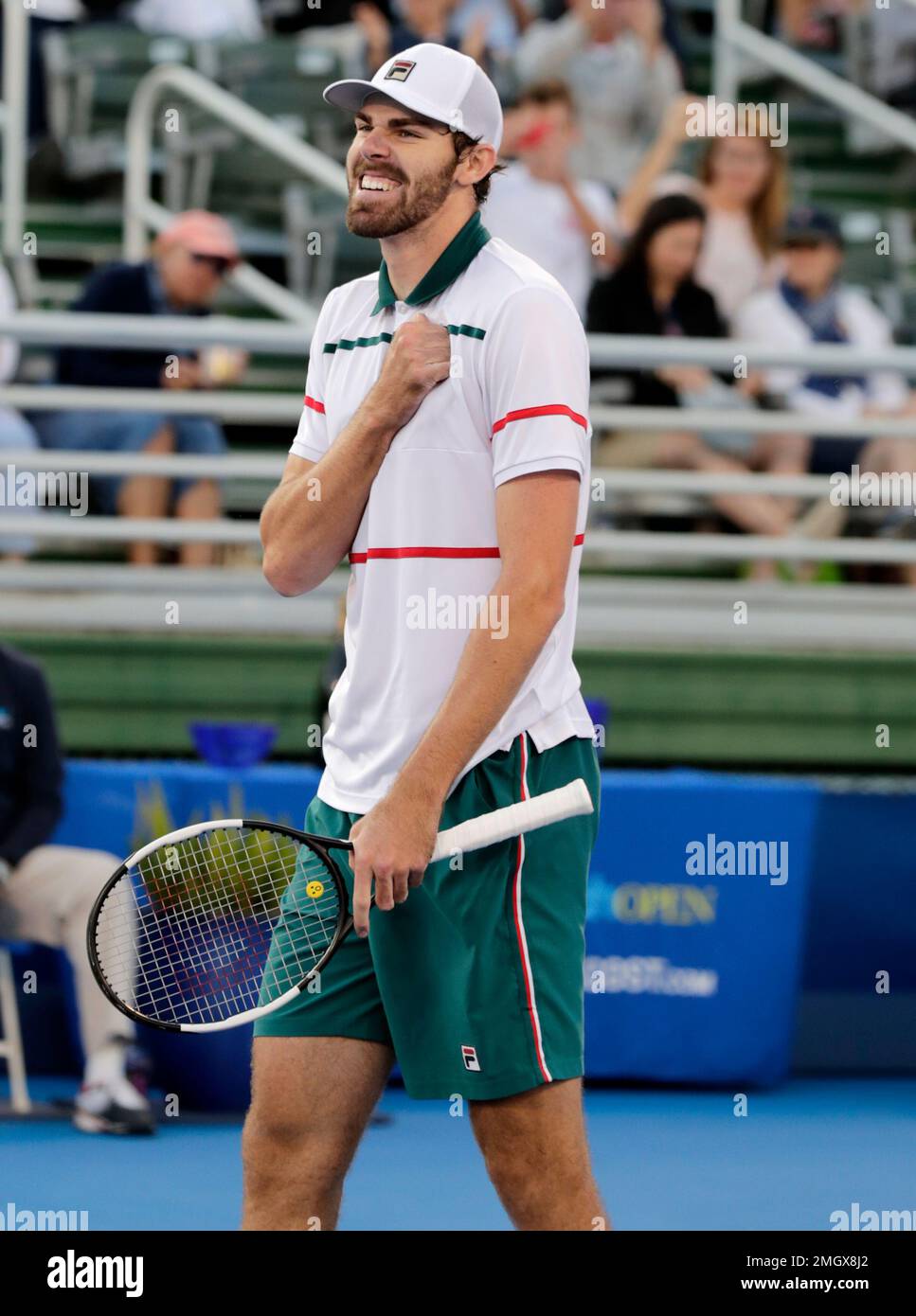 Reilly Opelka reacts after defeating Yoshihito Nishioka, of Japan, during the Delray Beach Open singles final tennis match, Sunday, Feb. 23, 2020, in Delray Beach, Fla. Opelka won 7-5, 6-7 (4), 6-2. (AP Photo/Lynne Sladky) Banque D'Images