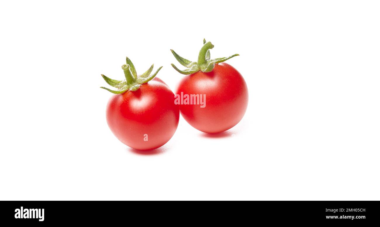 Tomate isolée sur fond blanc. Deux tomates rouges fraîches Banque D'Images