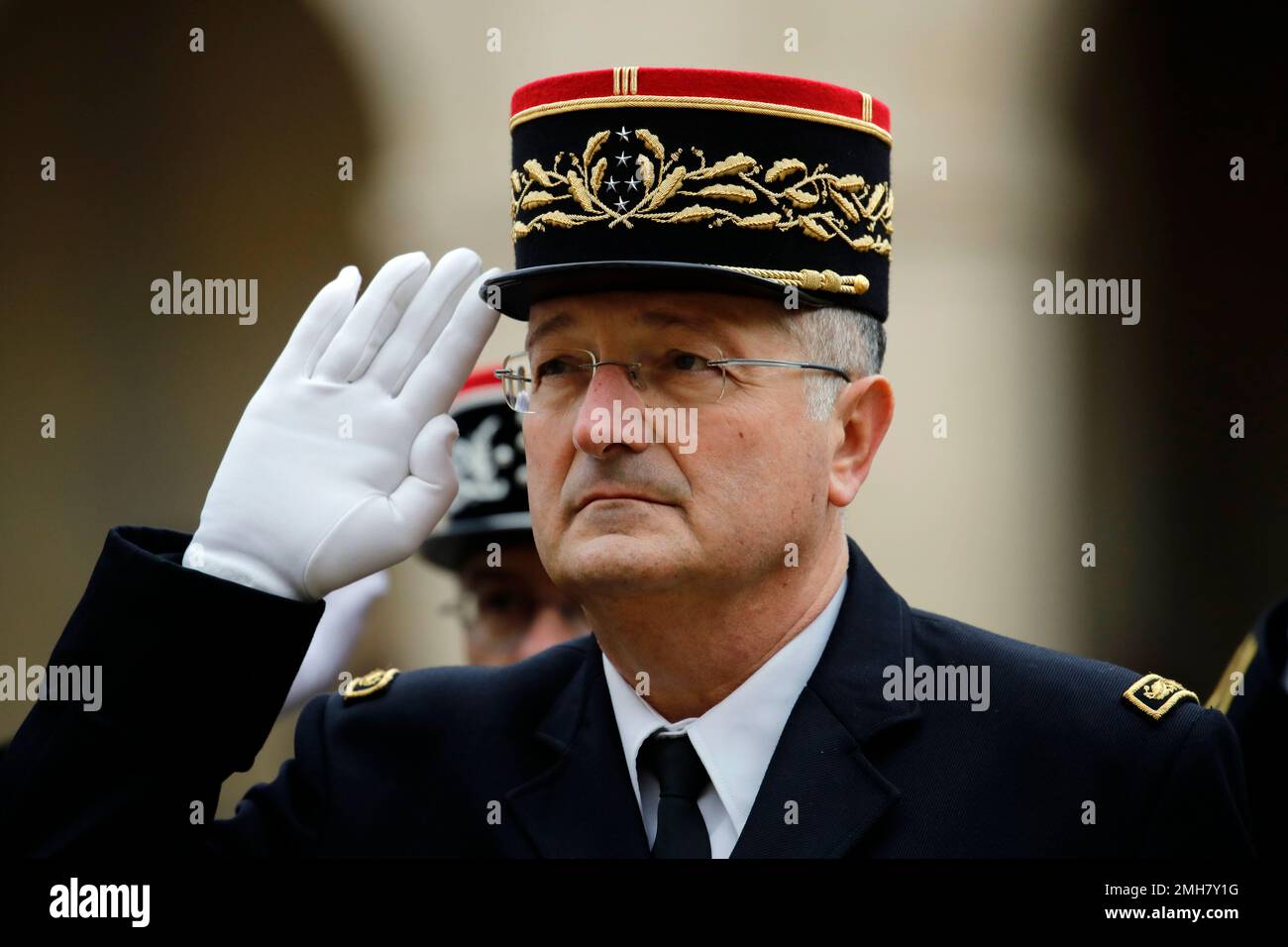 Christian Rodriguez General Director of the national Gendarmerie (Directeur general de la Gendarmerie nationale, or DGGN) listens to national anthem during a ceremony for the 2020 new year wishes to French gendarmes in Paris, Thursday, Jan. 9, 2020. (AP Photo/Christophe Ena) Banque D'Images