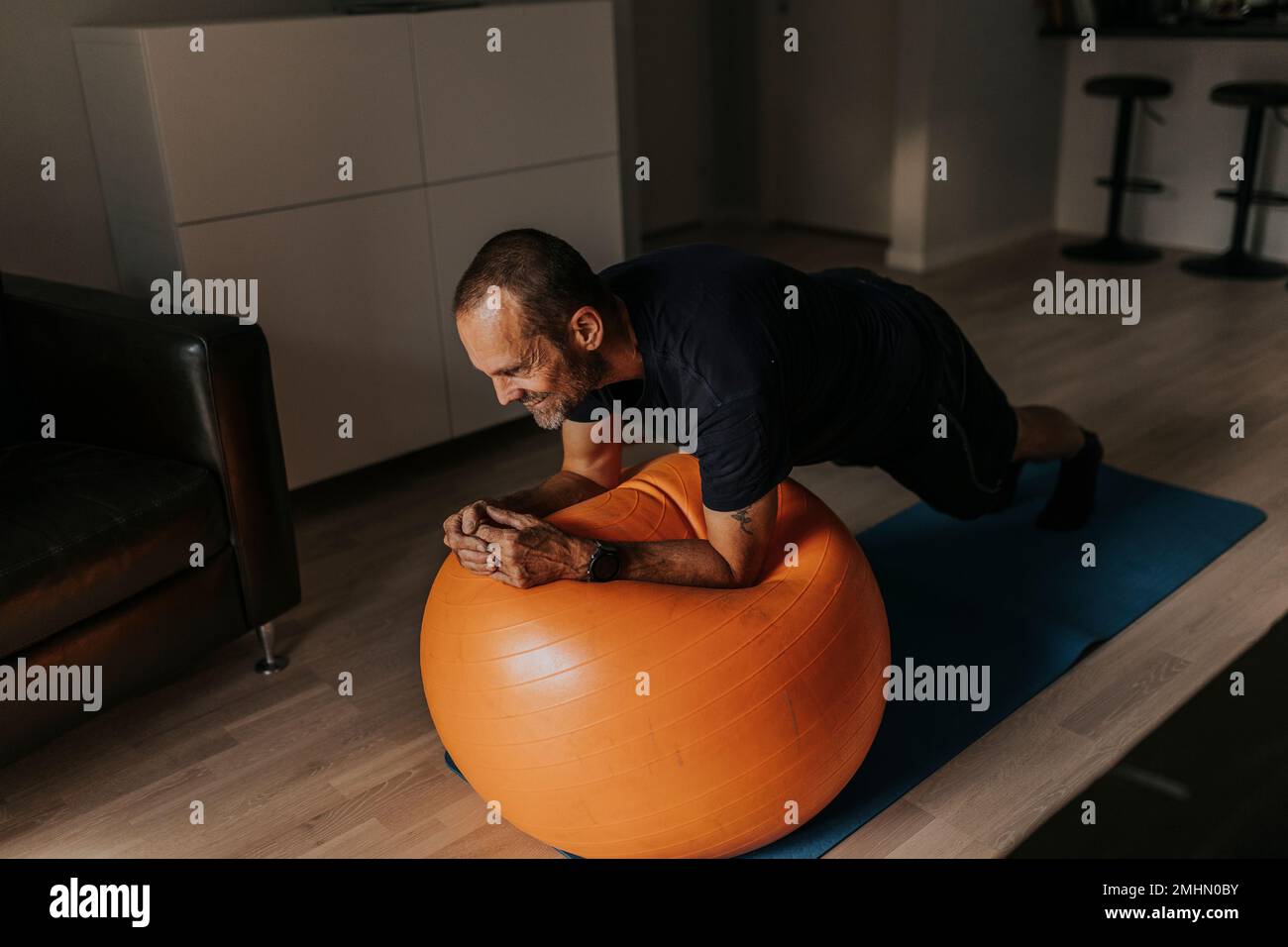 Entraînement de l'homme à la maison Banque D'Images