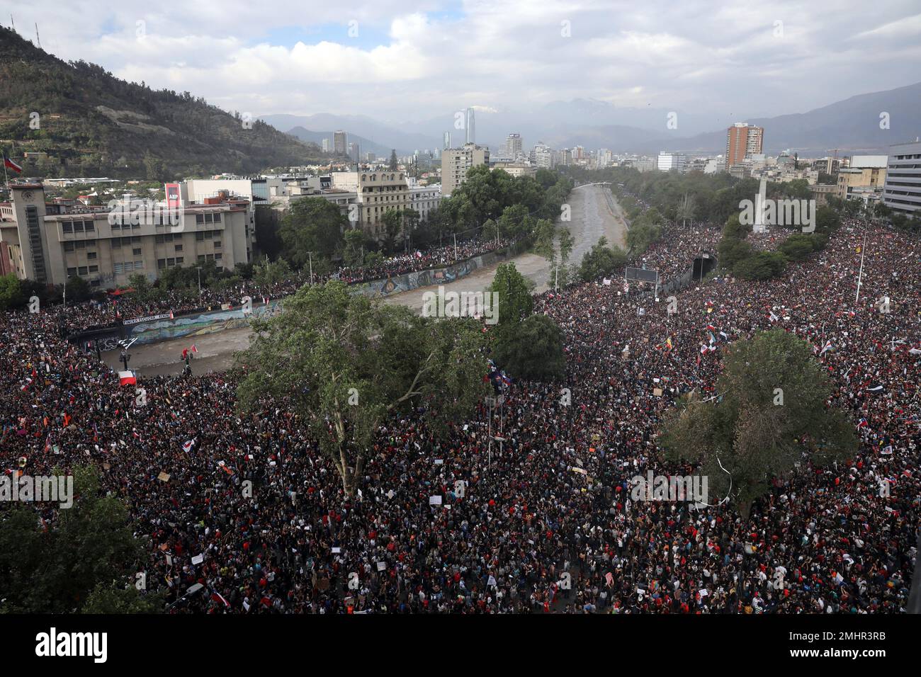 People gather during an anti-government protest in Santiago, Chile ...