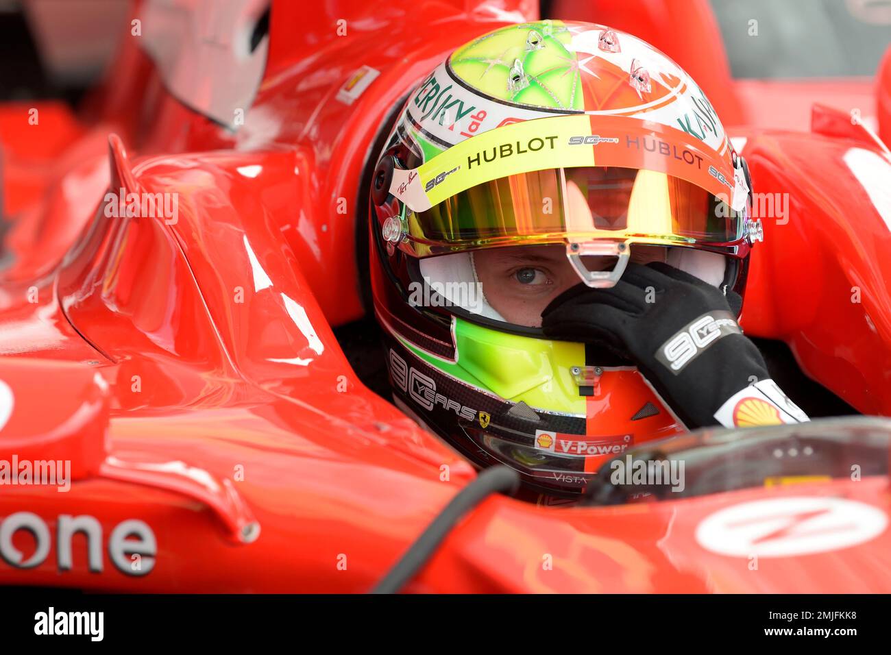 Germany's Mick Schumacher, son of Michael, sits on his father's Ferrari F2004 formula one car at the Hockenheimring racetrack in Hockenheim, Germany, Saturday, July 27, 2019. The German Formula One Grand Prix will be held on Sunday. (AP Photo/Jens Meyer) Banque D'Images