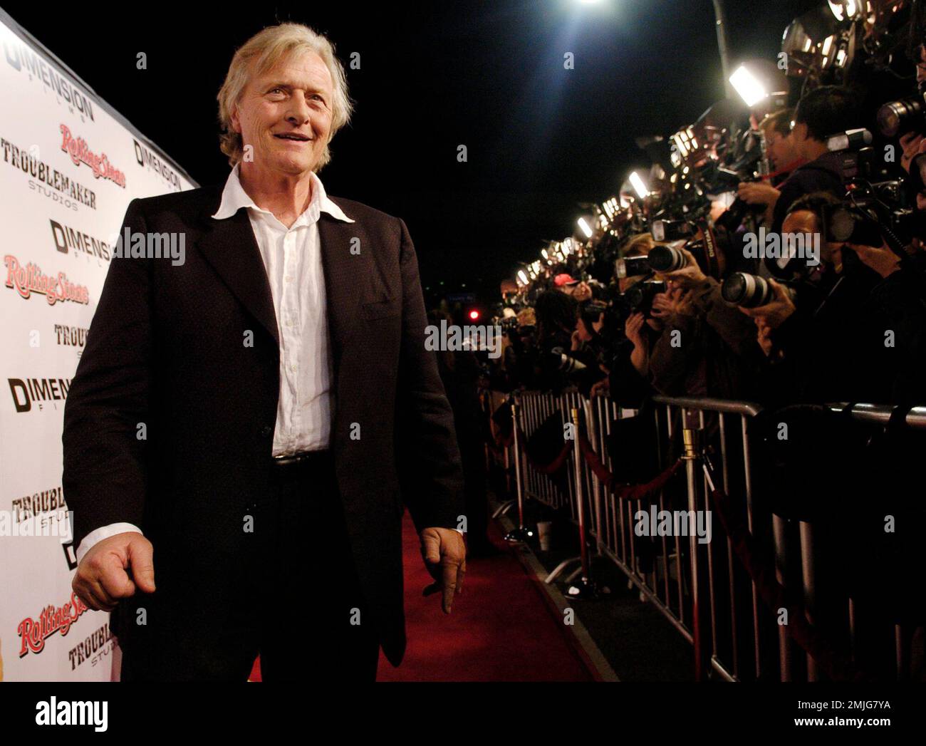 FILE - This March 28, 2005 file photo shows Dutch actor Rutger Hauer arriving at the premiere of "Sin City" in Los Angeles. Hauer, who specialized in menacing roles, including a memorable turn as a murderous android in "Blade Runner" opposite Harrison Ford, has died July 19 at his home in the Netherlands. He was 75. (AP Photo/Chris Pizzello, File) Banque D'Images
