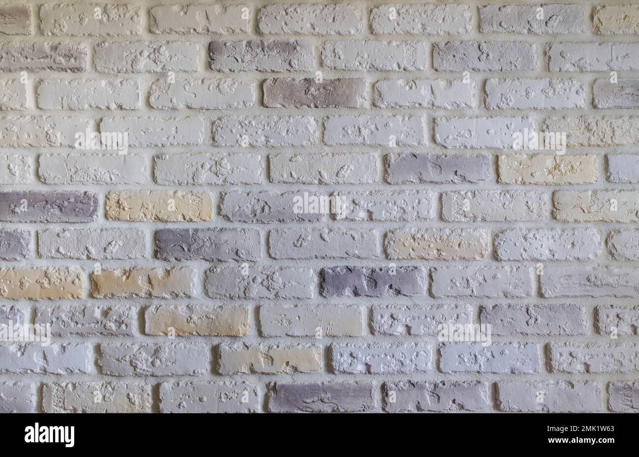 mur clair en briques colorées Banque D'Images