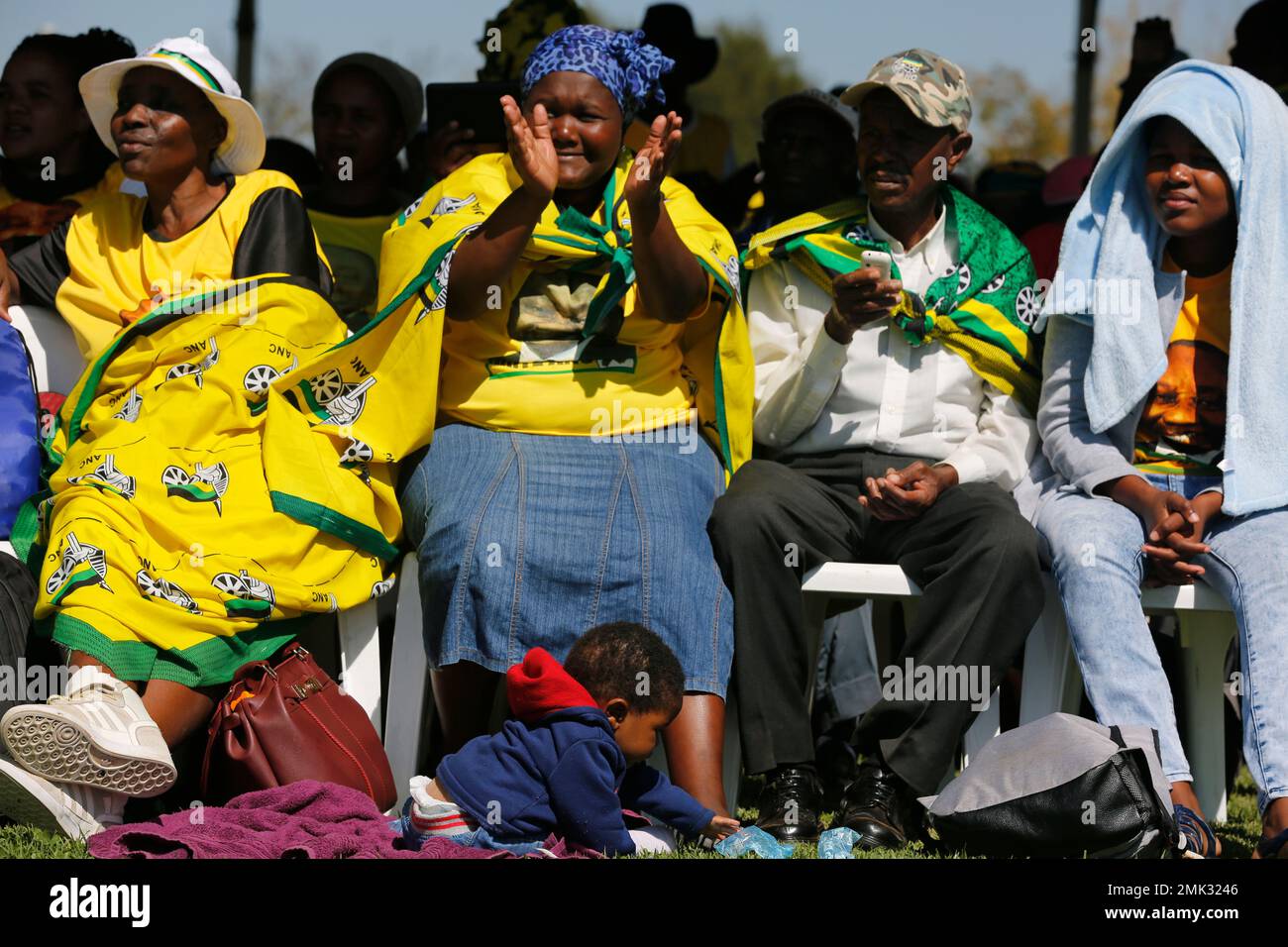 People attend Freedom Day celebrations in Kwa-Thema Township, near Johannesburg, Saturday April 27, 2019. The country celebrates the day which commemorates the 25th anniversary of the end of apartheid. (AP Photo/Denis Farrell) Banque D'Images