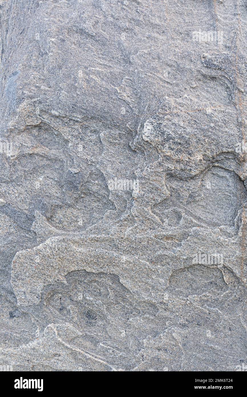 Gros plan sur une surface rocheuse étrange et magnifique, vue de face. Arrière-plan abstrait plein cadre texturé naturel. Banque D'Images