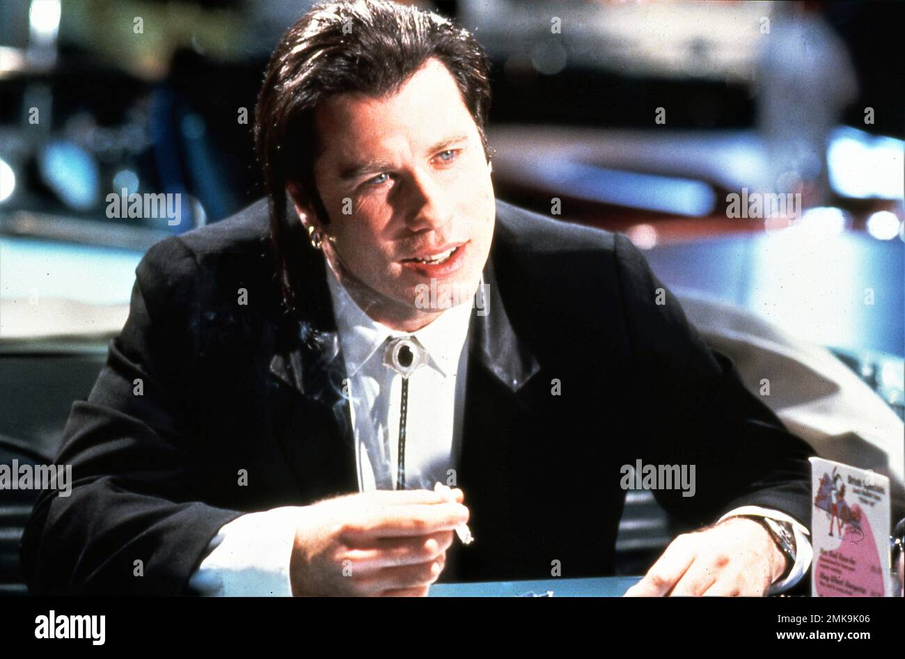 JOHN TRAVOLTA dans LA PÂTE DE FICTION 1994 réalisateur / écrivain QUENTIN TARANTINO histoires Quentin Tarantino et Roger Avary costume design Betsy Heimann producteur Lawrence Bender A Band Apart / Jersey Pictures / Miramax (Etats-Unis) - Buena Vista International (Royaume-Uni) Banque D'Images