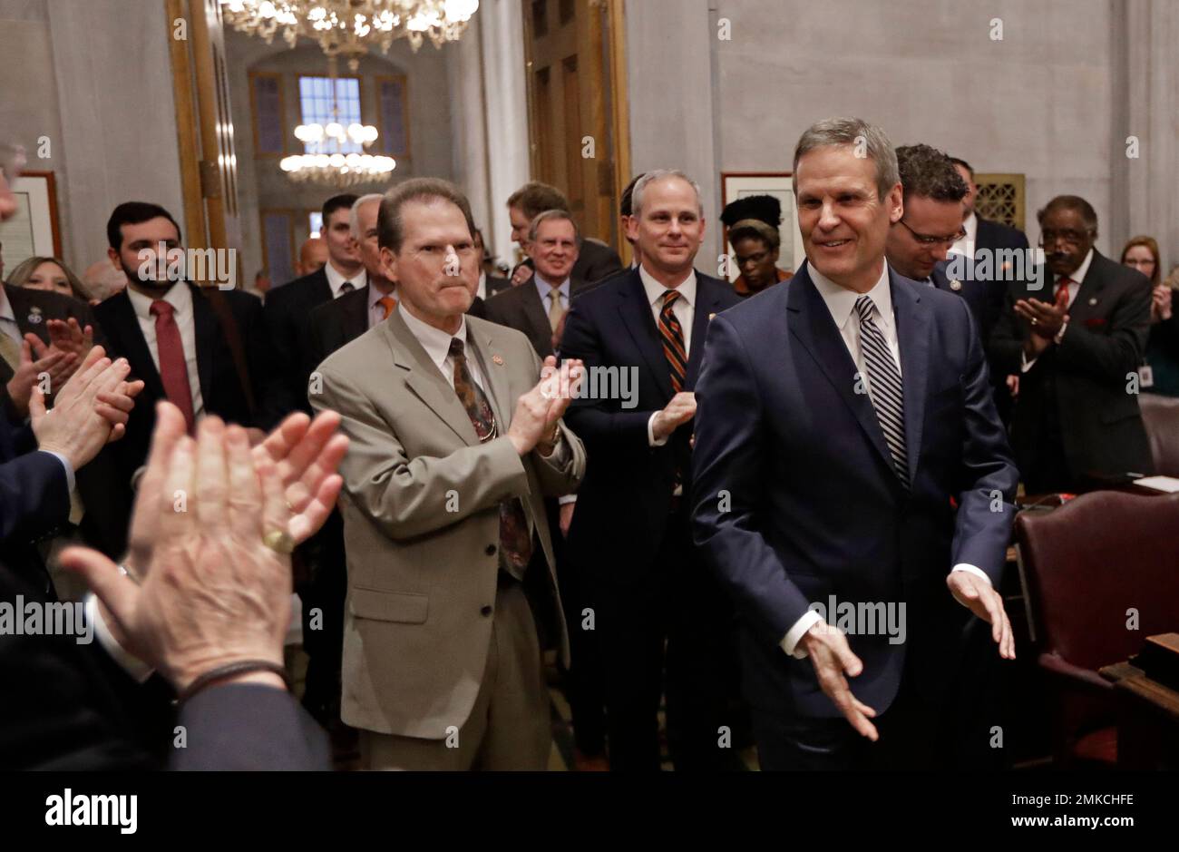 Tennessee Gov. Bill Lee, right, arrives in the House Chamber to deliver his first State of the State Address Monday, March 4, 2019, in Nashville, Tenn. (AP Photo/Mark Humphrey) Banque D'Images