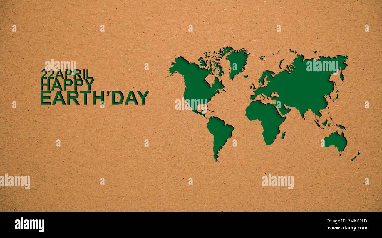Bannière web du jour de la terre de la carte du monde de coupe de papier. Carte du monde de la coupe du papier vert sur papier recyclé. Découpe de papier recyclé, concept d'économie de la planète. Carte du monde G Banque D'Images