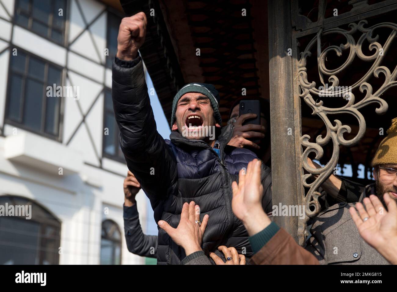 A Kashmiri protester shouts slogans during a traders' protest in ...