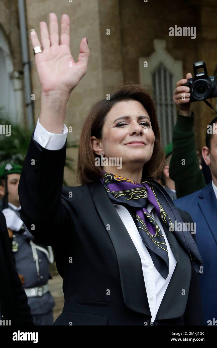 Newly appointed Interior Minister Raya El Hassan waves to former Lebanese  Interior Minister Nohad Machnouk as he leaves the interior ministry in  Beirut, Lebanon, Wednesday, Feb. 6, 2019. El Hassan is one