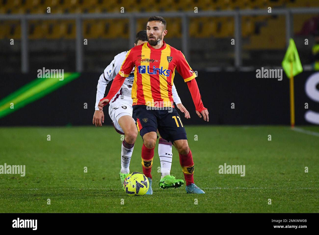 Captain Fabio Lucioni (US Lecce) raises the cup to the sky for the