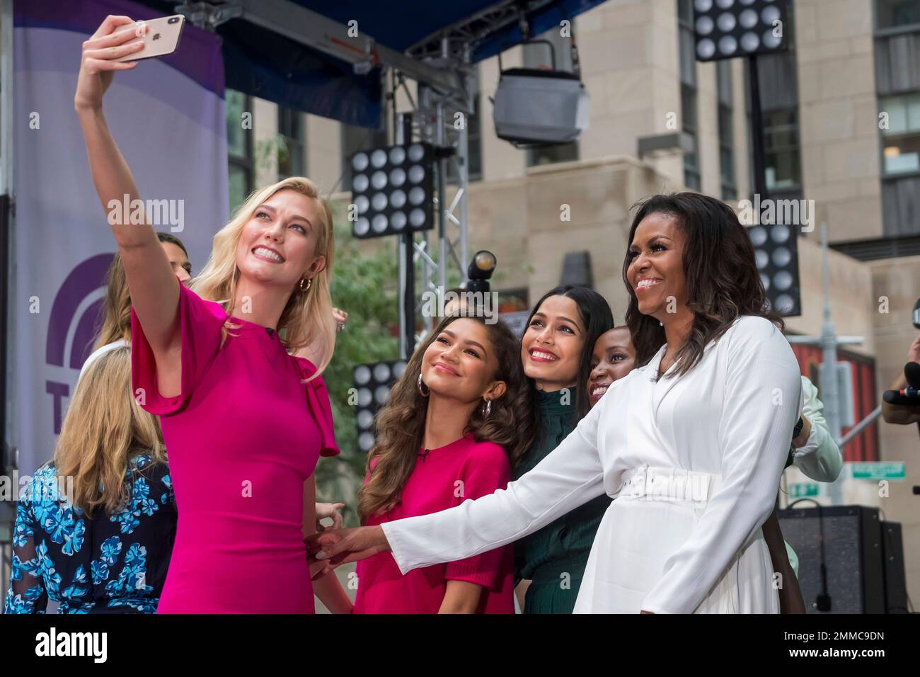 Karlie Kloss, from left, Zendaya, Freida Pinto, Monica Nyiraguhabwa and Michelle Obama participate in the International Day of the Girl on NBC's "Today" show at Rockefeller Plaza on Thursday, Oct. 11, 2018, in New York. (Photo by Charles Sykes/Invision/AP) Banque D'Images