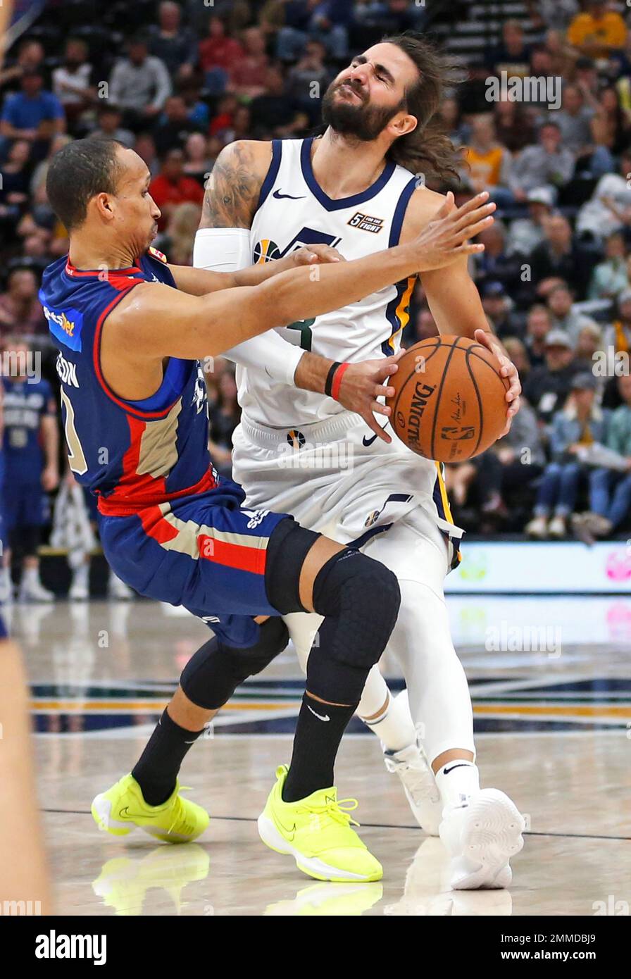 Adelaide 36ers guard Adris De Leon, left, fouls Utah Jazz guard Ricky Rubio  during the first half of an NBA exhibition basketball game Friday, Oct. 5,  2018, in Salt Lake City. (AP