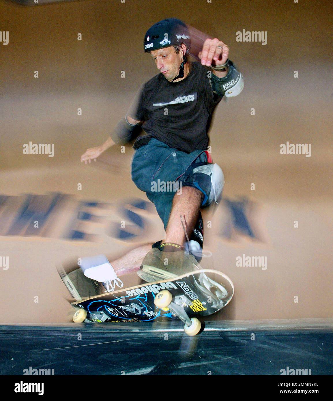 FILE - In this Friday, Aug. 15, 2003 file photo, Tony Hawk of Carlsbad,  Calif. slides a rail during the X-Games - skateboard vert practice held at  the Staples Center in Los