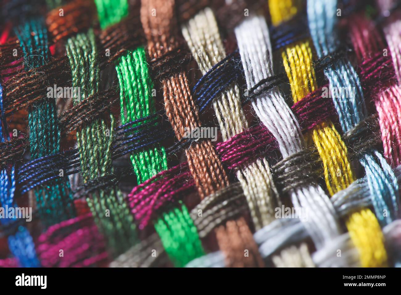 Détail de fils de couture tissés colorés Banque D'Images