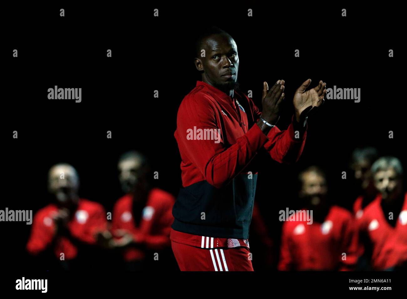 Former Olympic and Jamaican sprinter Usain Bolt arrives to attend a