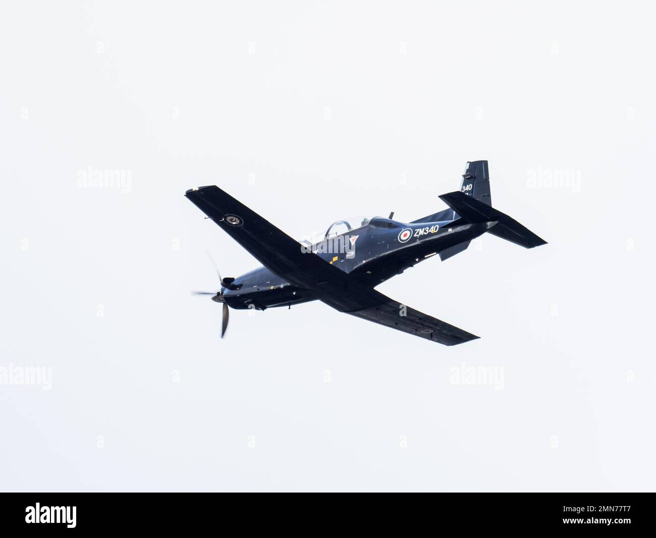 Un avion Texan T1, utilisé comme avion d'entraînement pour les pilotes d'avions de chasse de la RAF, praqctising survolant Ambleside, Lake District, Royaume-Uni. Banque D'Images