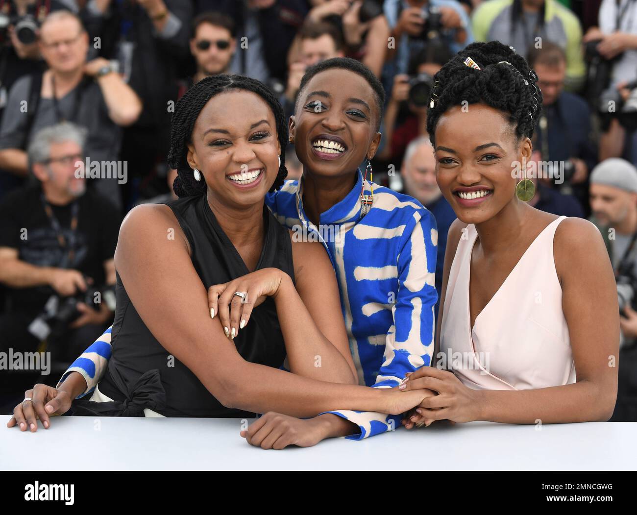 Director Wanuri Kahiu, from left, actress Samantha Mugatsia and actress Sheila Munyiva pose for photographers during a photo call for the film 'Rafiki' at the 71st international film festival, Cannes, southern France, Wednesday, May 9, 2018. (Photo by Arthur Mola/Invision/AP) Banque D'Images