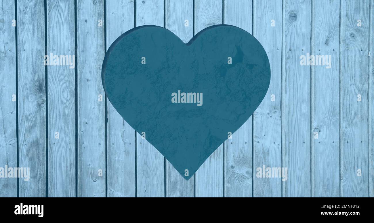 Composé de coeur bleu découpé en bois bleu et espace de copie Banque D'Images
