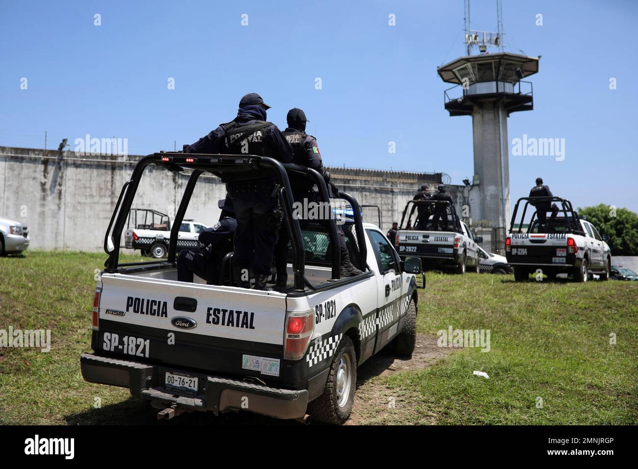 State police patrol outside La Toma prison in Amatlan de los Reyes