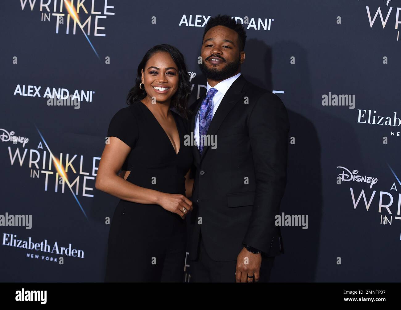 Zinzi Evans, left, and Ryan Coogler arrive at the world premiere of "A Wrinkle in Time" at the El Capitan Theatre on Monday, Feb. 26, 2018, in Los Angeles. (Photo by Jordan Strauss/Invision/AP) Banque D'Images