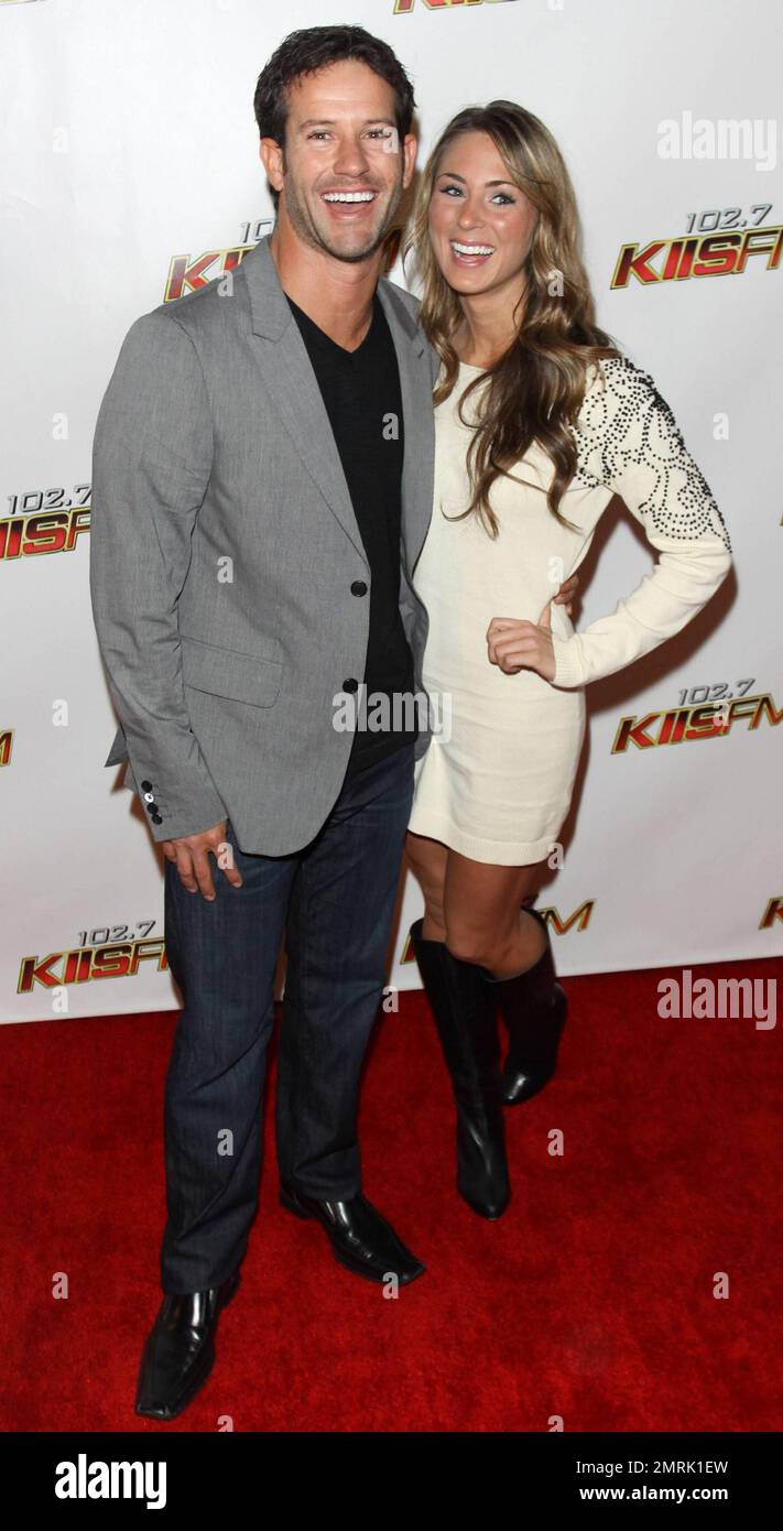 Tenley Molzahn et Kiptyn Locke posent sur le tapis rouge pendant le KISS FM Jingle ball 2010 tenu au Nokia Theatre. Los Angeles, Californie. 12/05/10. Banque D'Images