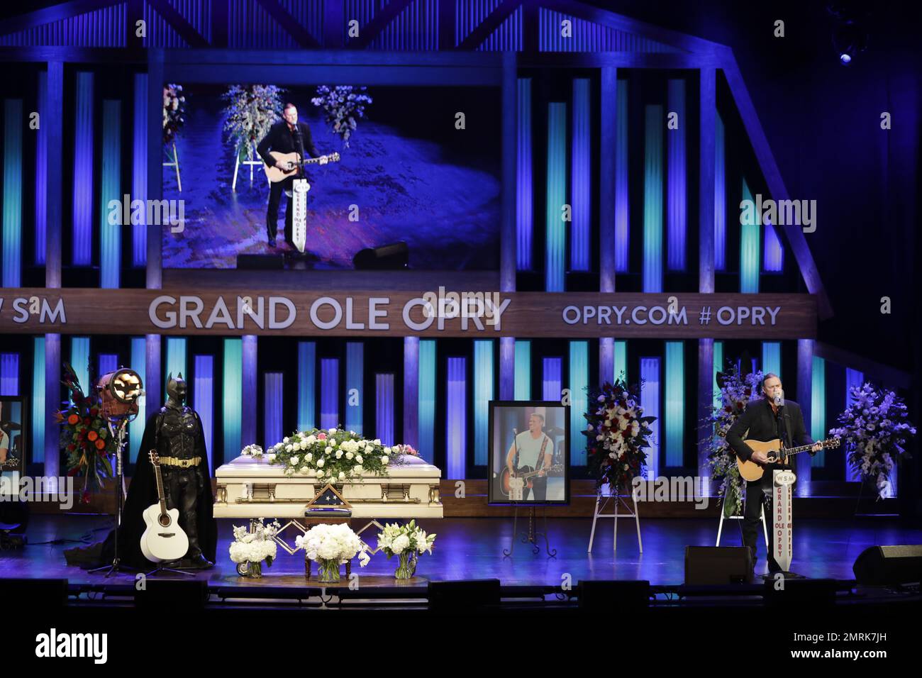 Trace Adkins performs during a memorial service for country music