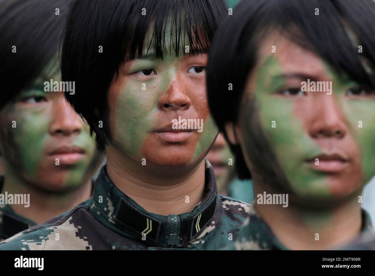 Female soldiers of Chinese People's Liberation Army (PLA) line up ...