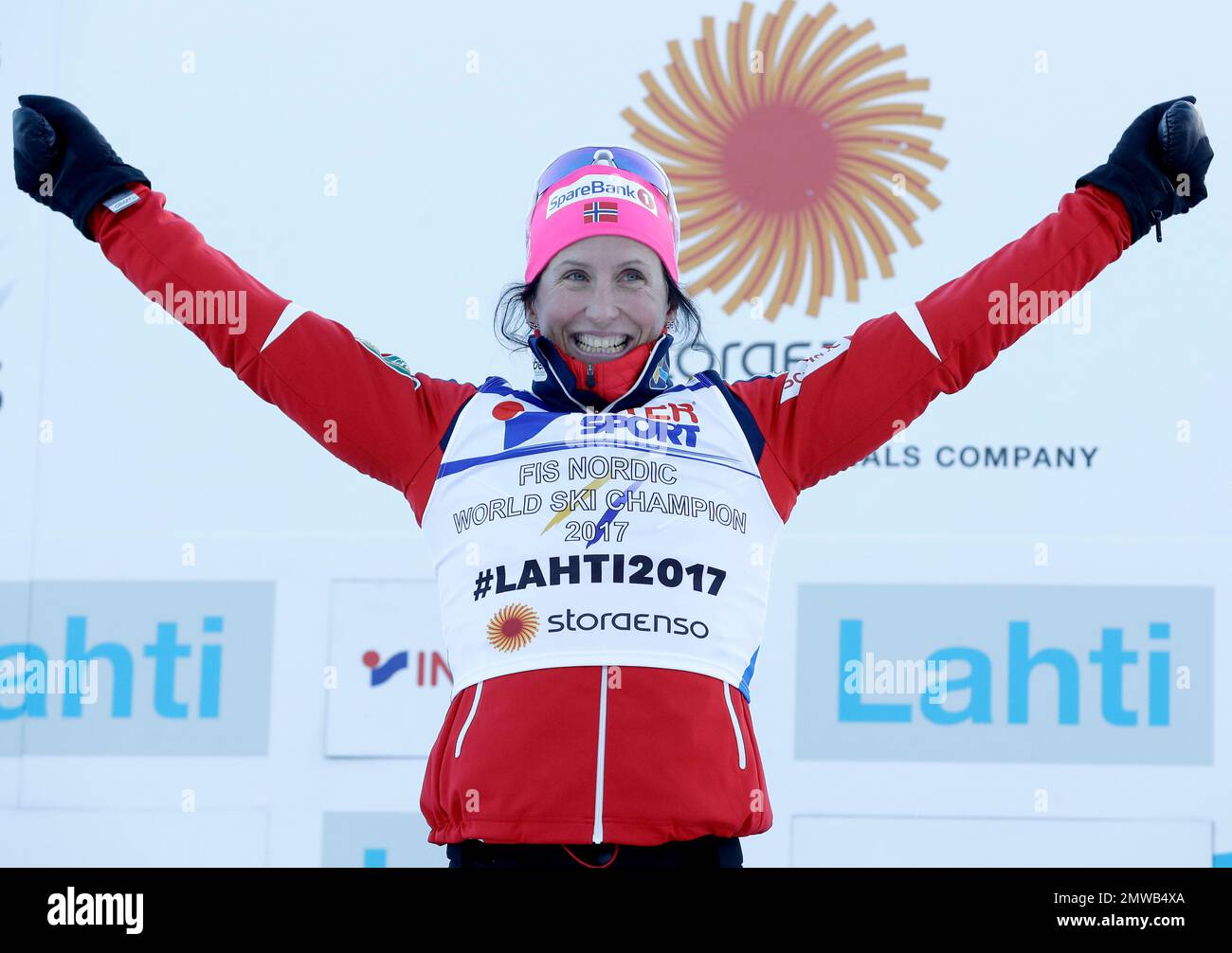 First placed Norway's Marit Bjoergen celebrates during the flower ceremony for the women's cross country 30 km mass start free competition at the 2017 Nordic Skiing World Championships in Lahti, Finland, Saturday, March 4, 2017. (AP Photo/Matthias Schrader) Banque D'Images