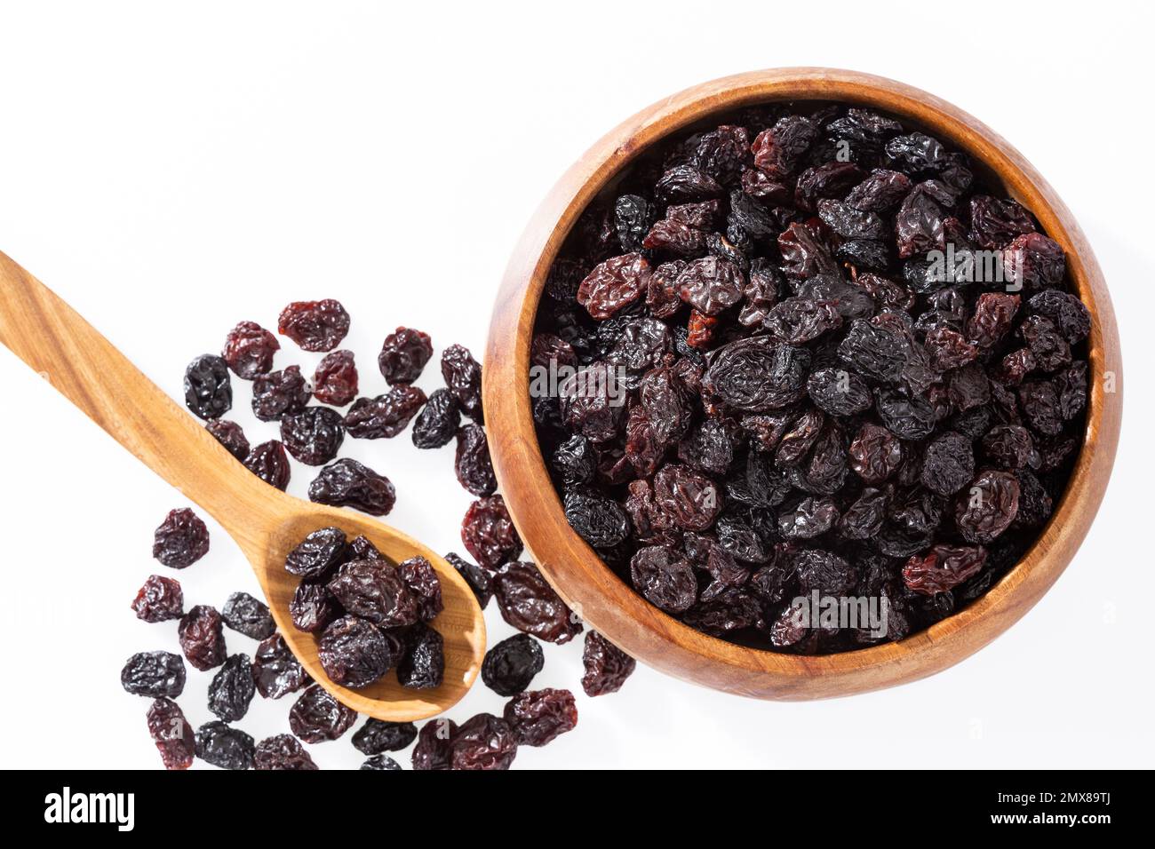 Alimentation saine - noix raisins déshydratés; photo fond blanc Banque D'Images