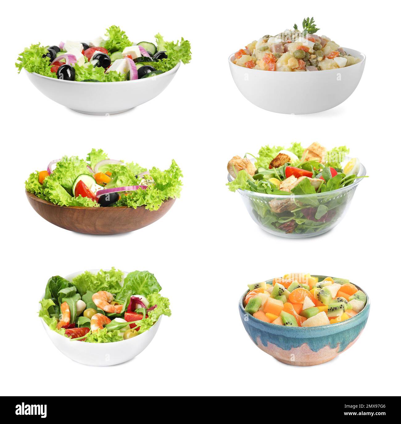 Set avec différentes salades sur fond blanc Banque D'Images