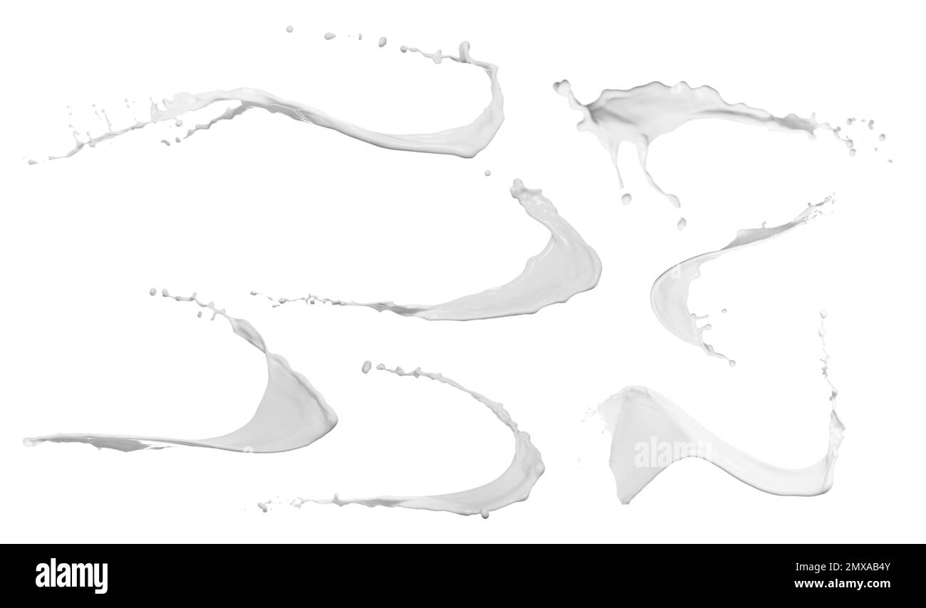Set avec des éclaboussures abstraites de lait sur fond blanc Banque D'Images