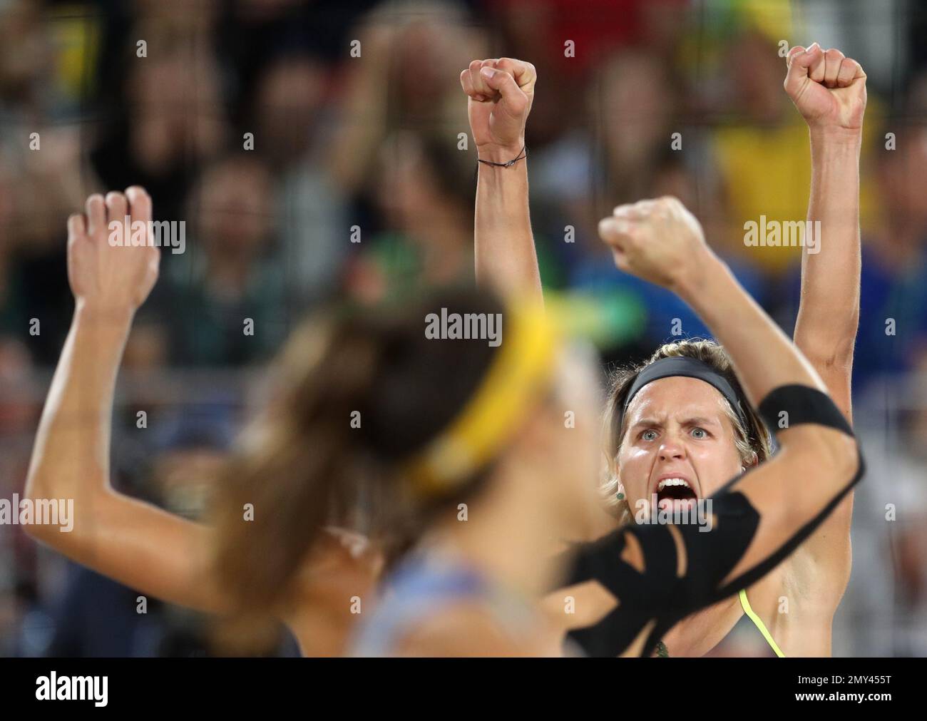 Germany's Laura Ludwig celebrates winning a point during a women's beach volleyball gold medal match against Brazil at the 2016 Summer Olympics in Rio de Janeiro, Brazil, Thursday, Aug. 18, 2016. (AP Photo/Petr David Josek) Banque D'Images