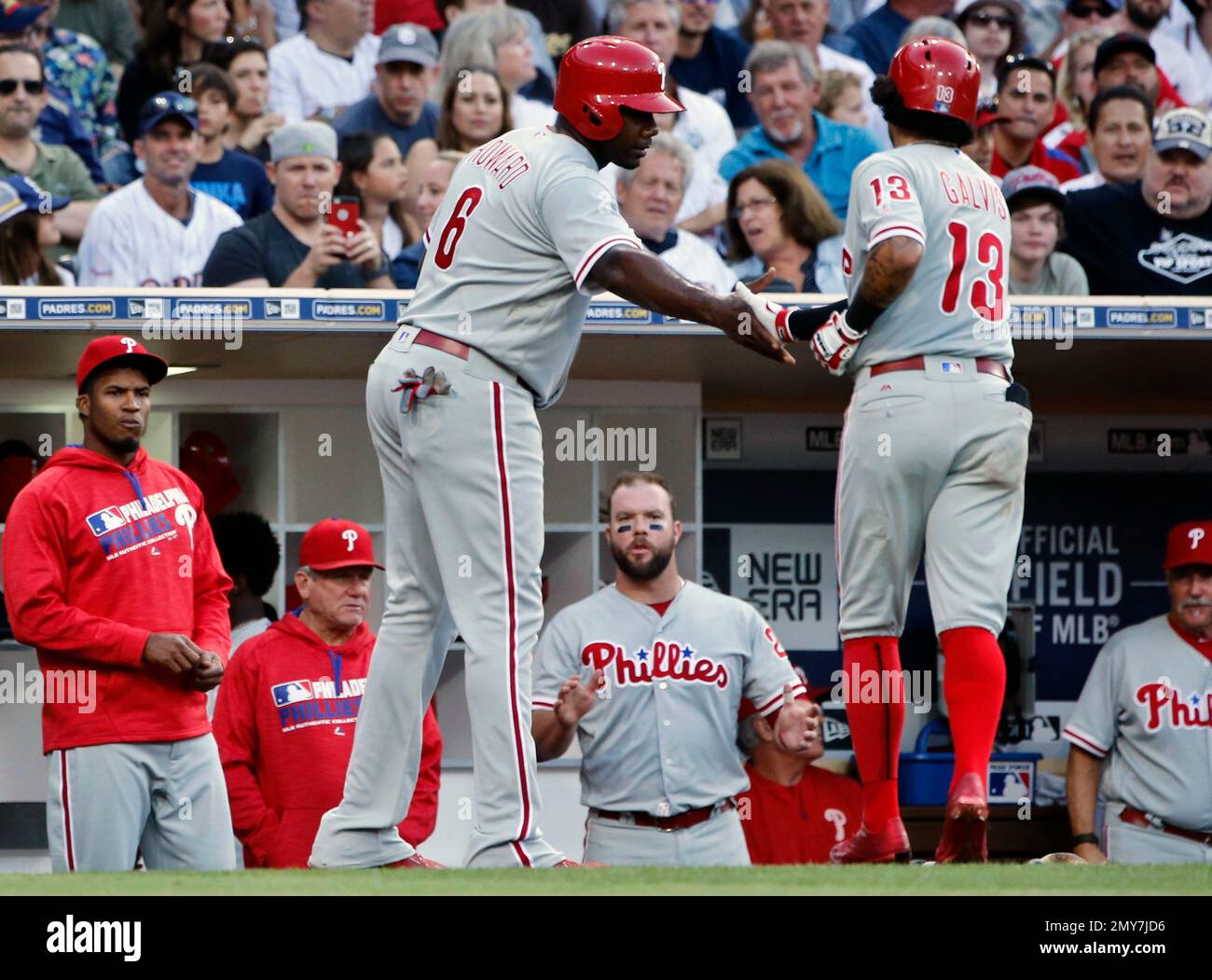 Philadelphia Phillies' Ryan Howard congratulates Freddy Galvis after scoring on Gavis' ground out against the San Diego Padres in the fourth inning of a baseball game Saturday, Aug. 6, 2016, in San Diego. (AP Photo/Lenny Ignelzi) Banque D'Images