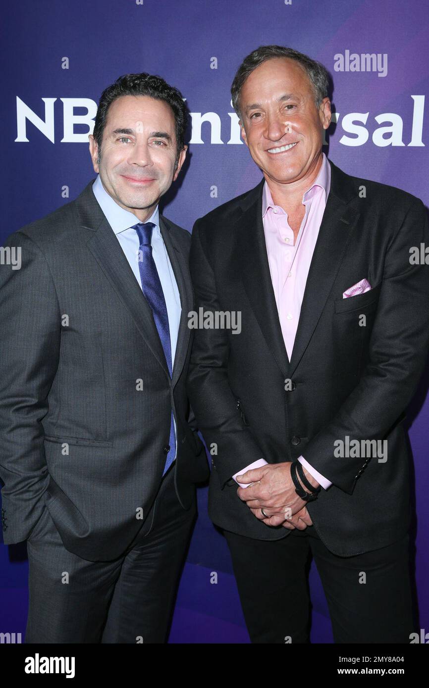 Dr. Paul Nassif, left, and Dr. Terry Dubrow, cast members in the television series "Botched By Nature," arrive at the NBCUniversal Television Critics Association summer press tour on Wednesday, Aug. 3, 2016, in Beverly Hills, Calif. (Photo by Rich Fury/Invision/AP) Banque D'Images