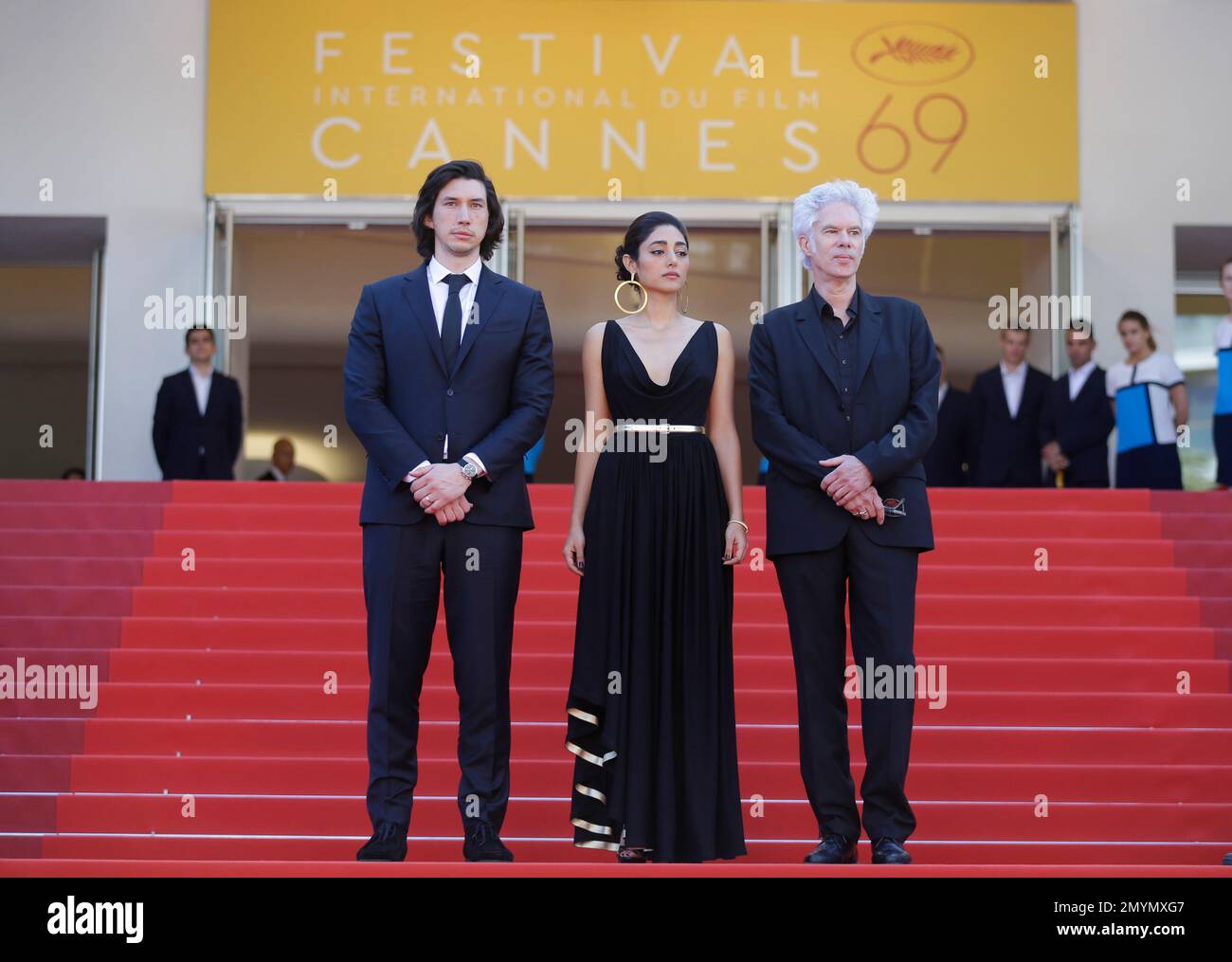 Actors Adam Driver, from left, Golshifteh Farahani and director Jim Jarmusch pose for photographers upon arrival at the screening of the film Paterson at the 69th international film festival, Cannes, southern France, Monday, May 16, 2016. (AP Photo/Lionel Cironneau) Banque D'Images