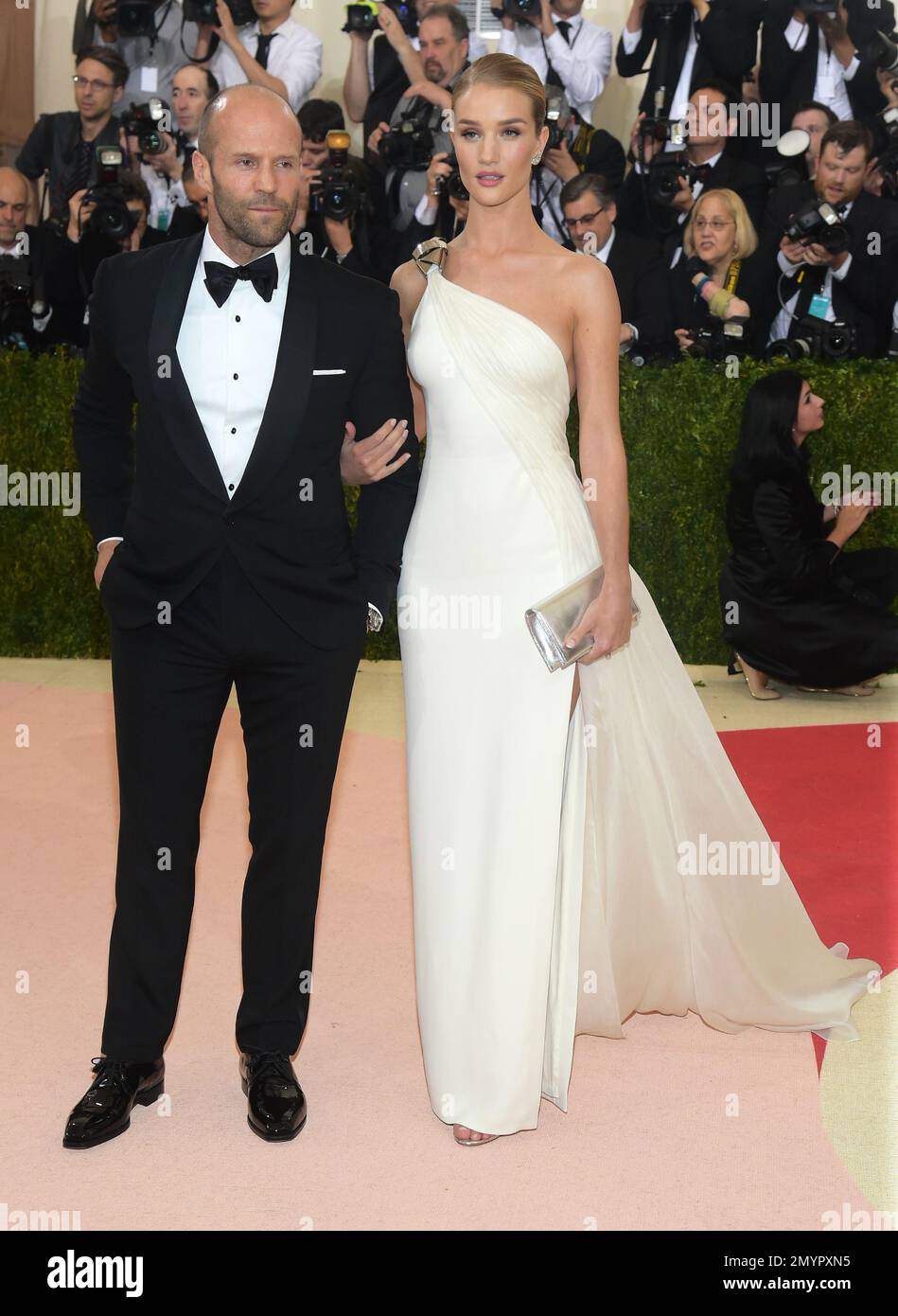 jason-statham-left-and-rosie-huntington-whiteley-arrive-at-the