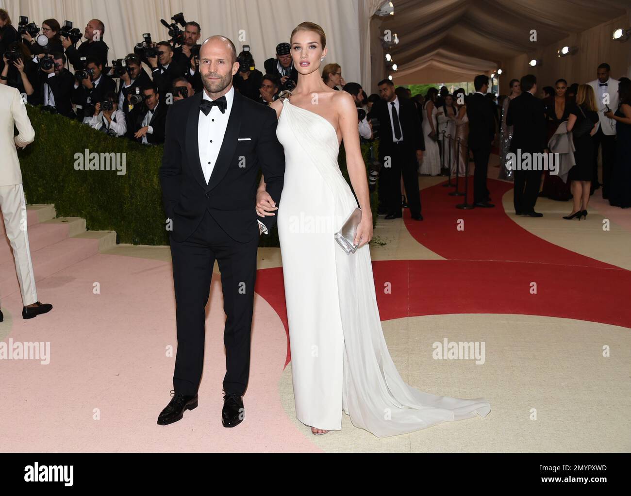 jason-statham-left-and-rosie-huntington-whiteley-arrive-at-the