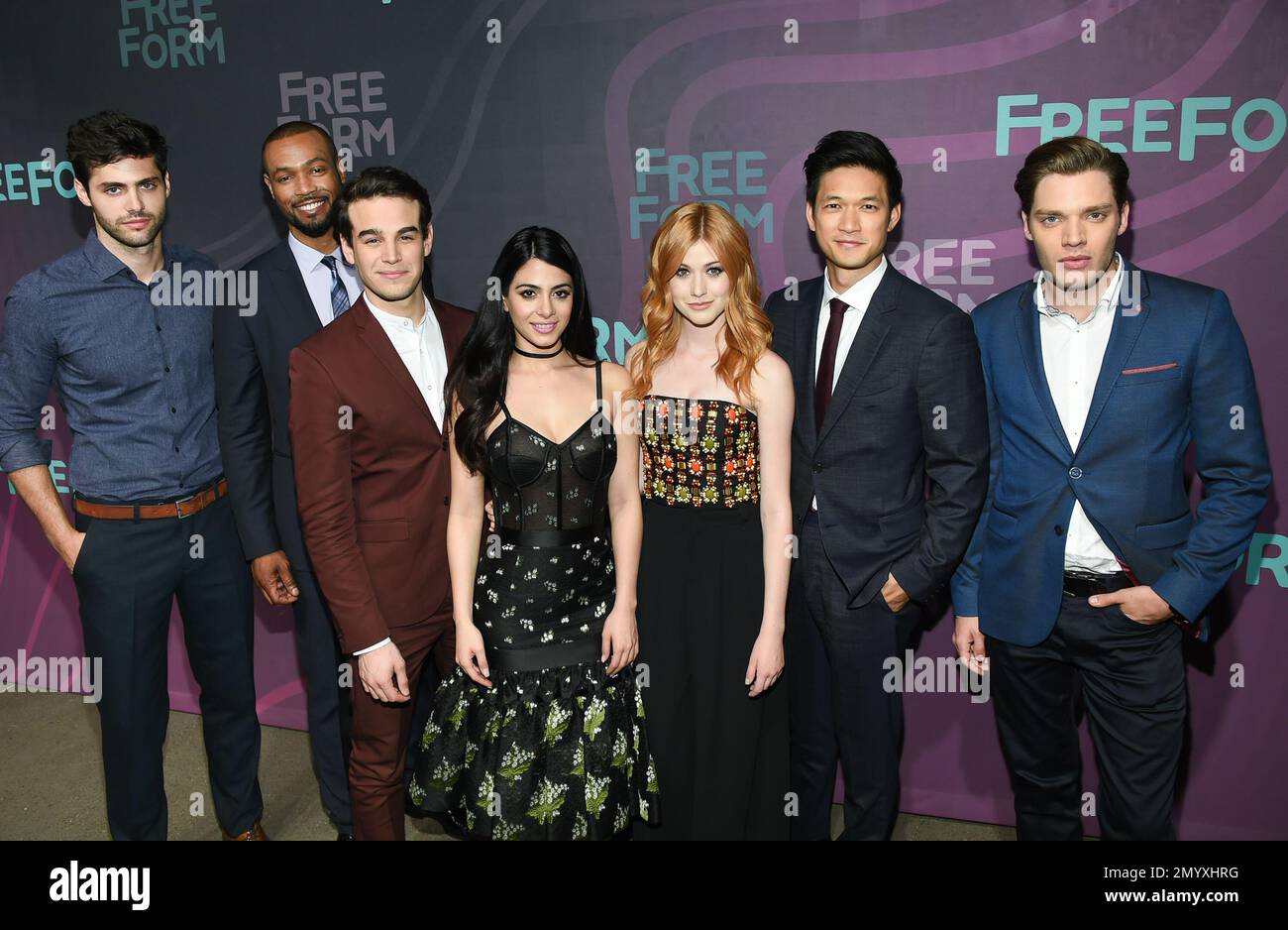 "Shadowhunters" cast members, from left, Matthew Daddario, Isaiah Mustafa, Alberto Rosende, Emeraude Toubia, Katherine McNamara, Harry Shum Jr. and Dominic Sherwood attend the ABC Freeform 2016 Upfront at Spring Studios on Thursday, April 7, 2016, in New York. (Photo by Evan Agostini/Invision/AP) Banque D'Images