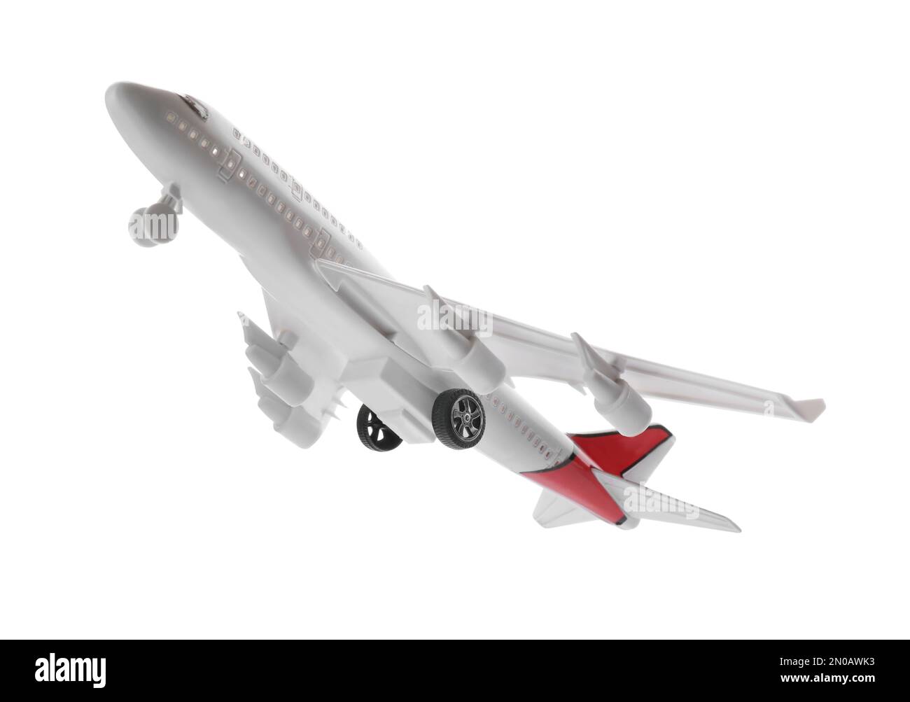 Jouet avion isolé sur blanc. Concept de voyage Banque D'Images