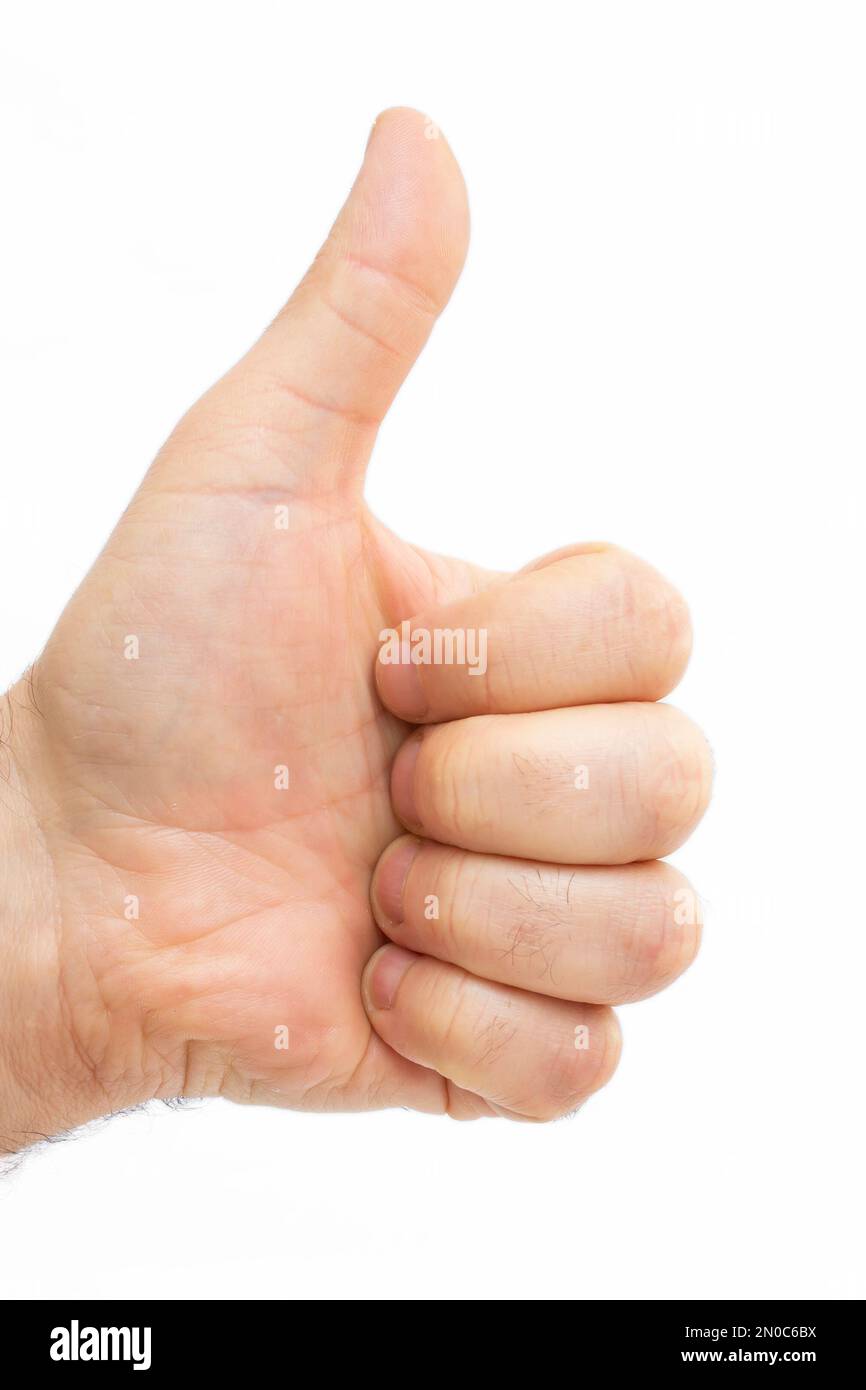 Main d'homme avec le pouce vers le haut isolée sur fond blanc, gros plan Banque D'Images