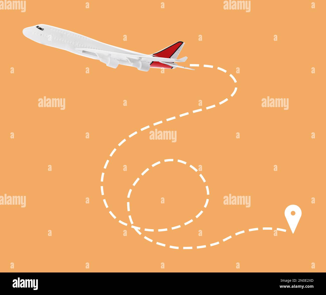 Illustration du sens de vol. Plan et broche connectés par une ligne pointillée sur fond orange Banque D'Images