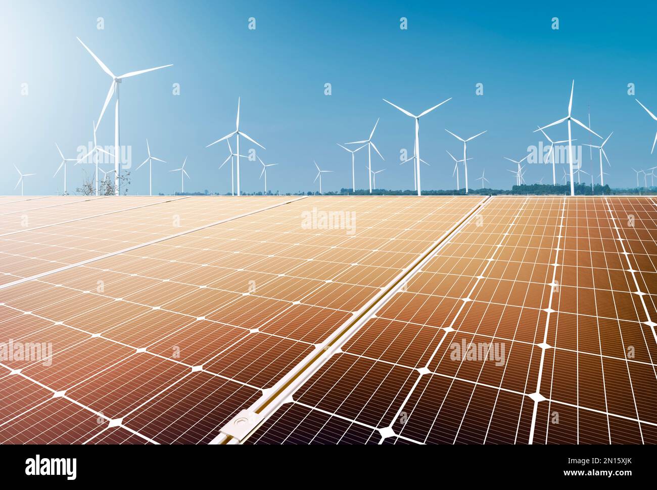 éolienne et panneau solaire au coucher du soleil. énergie renouvelable.énergie renouvelable pour les entreprises. Banque D'Images