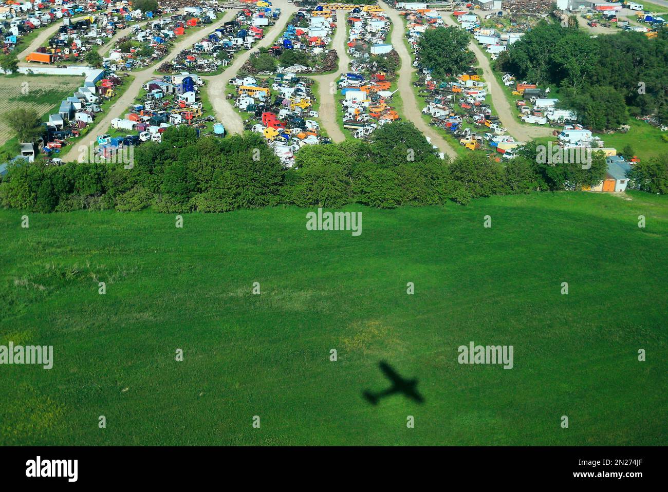 In this June 1, 2015 photo, a shadow of a small plane is seen as it