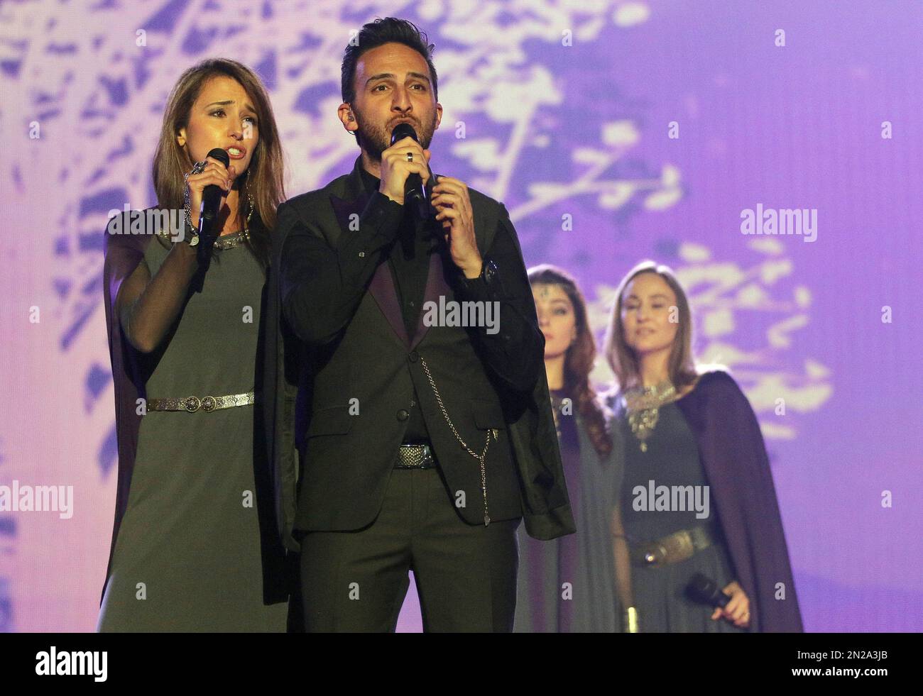 Genealogy representing Armenia perform the song 'Face The Shadow' on stage during a dress rehearsal for the final of the Eurovision Song Contest in Austria's capital Vienna, Friday, May 22, 2015. (AP Photo/Ronald Zak) Banque D'Images