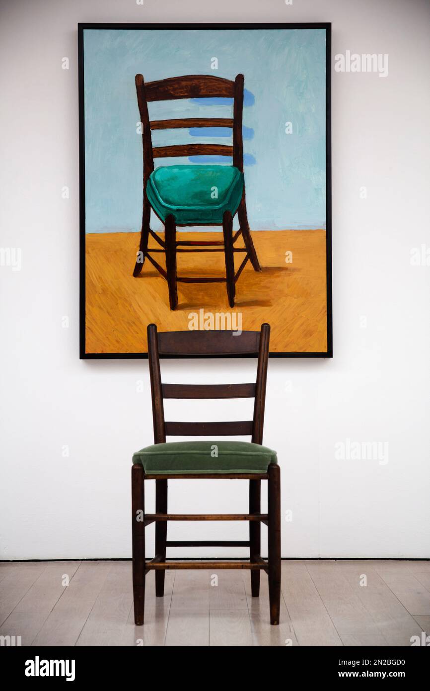 A chair sits in front of the British artist David Hockney's acrylic on  canvas "The Chair" which features as part of the "David Hockney Painting  and Photography" exhibition at the Annely Juda