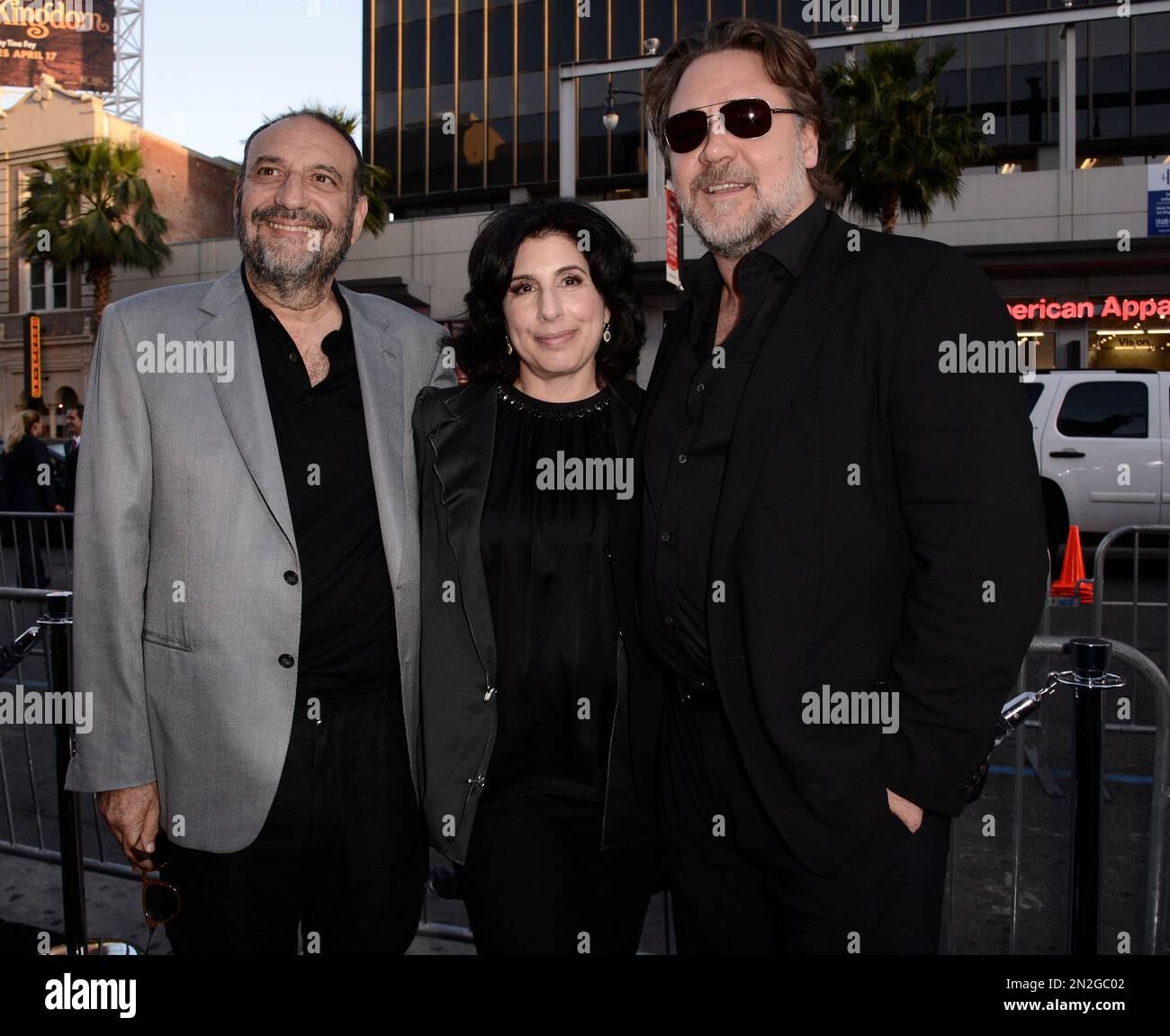 From left to right, producer Joel Silver, President, Worldwide Marketing and International Distribution, Warner Bros. Pictures Sue Kroll, and actor and director Russell Crowe attend the premiere of the feature film "The Water Diviner" in Los Angeles on Thursday, April 16, 2015. (Photo by Dan Steinberg/Invision/AP) Banque D'Images