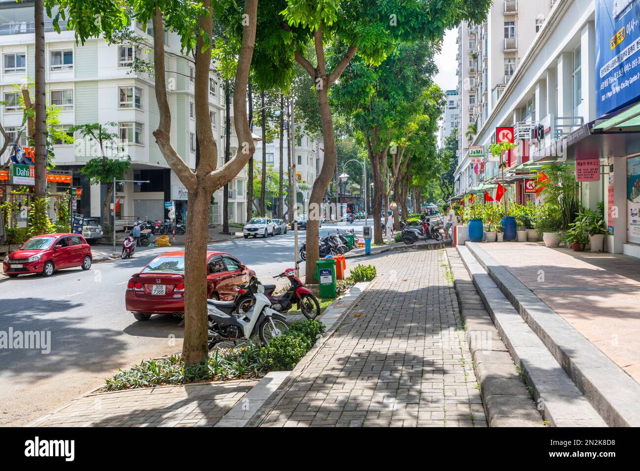 Une scène de rue calme dans le quartier 7 de Ho Chi Minh ville, Vietnam. Banque D'Images